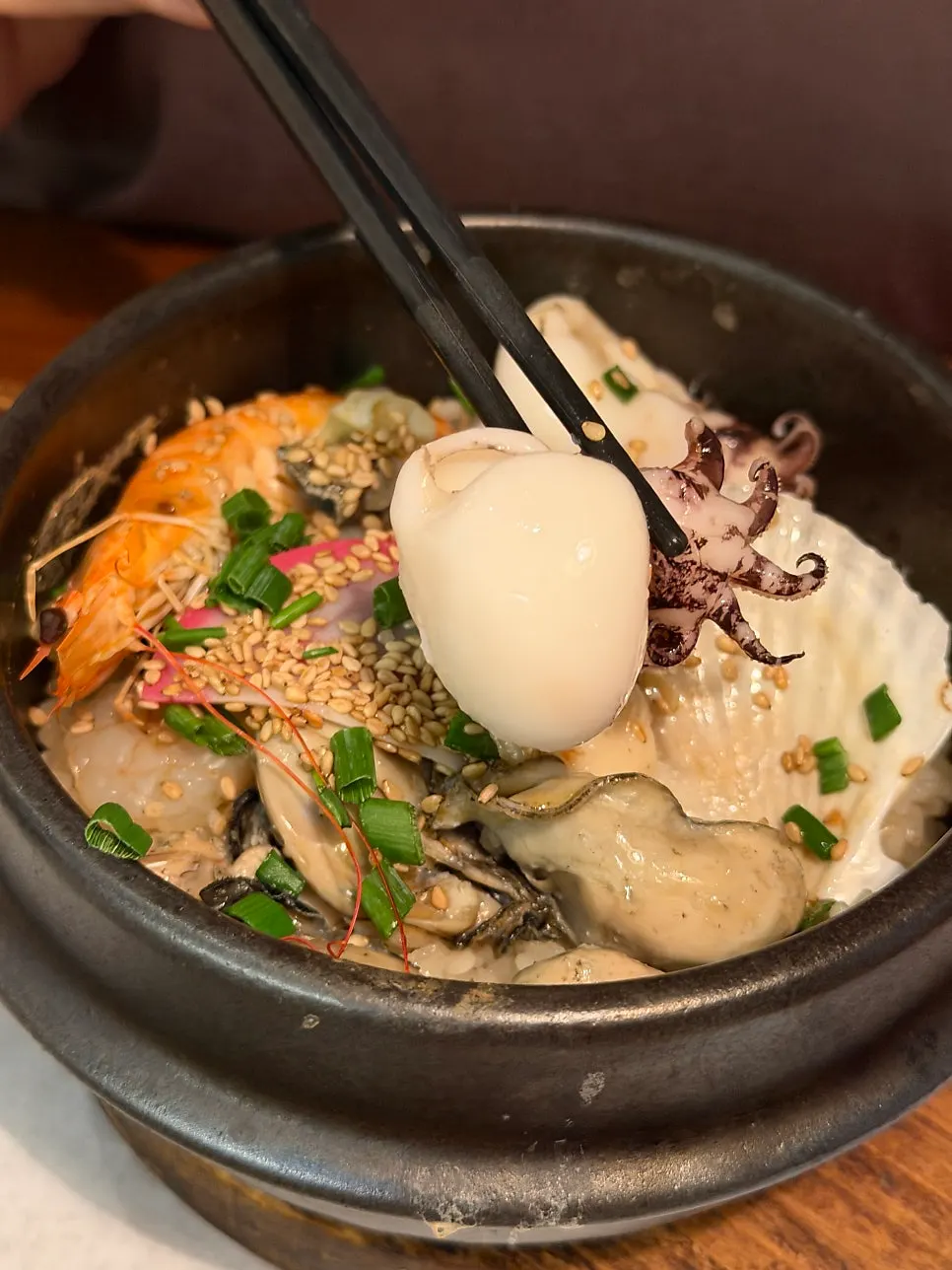Tender seafood inside the seafood sotbap, easy to bite through