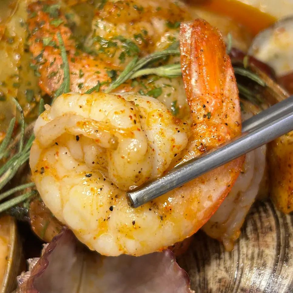 A plate of red seafood gambas