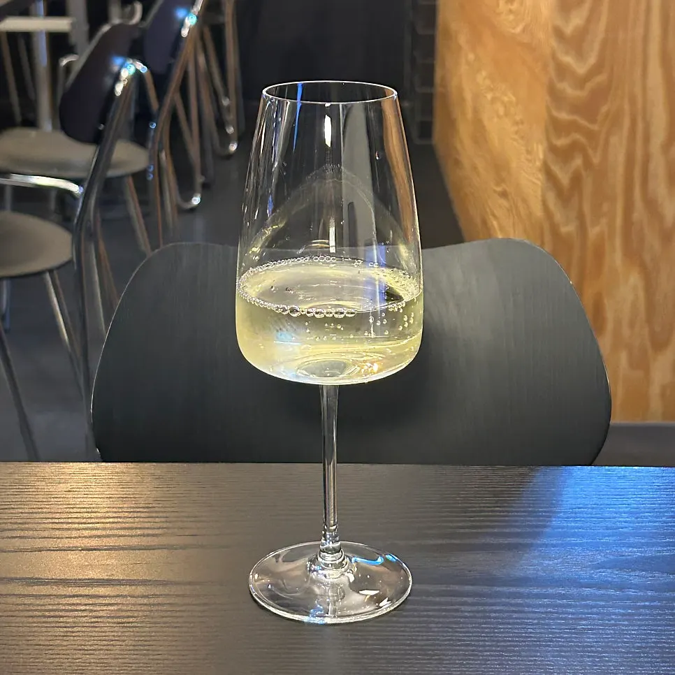 White wine paired with red seafood gambas