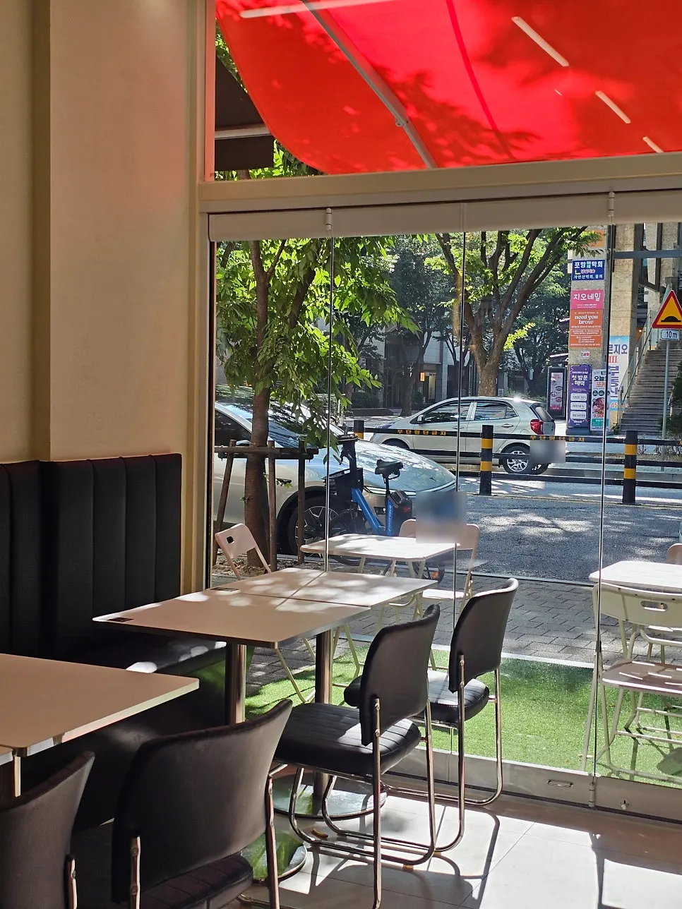 Bar-style counter seats at Roaster Burger, good for solo dining