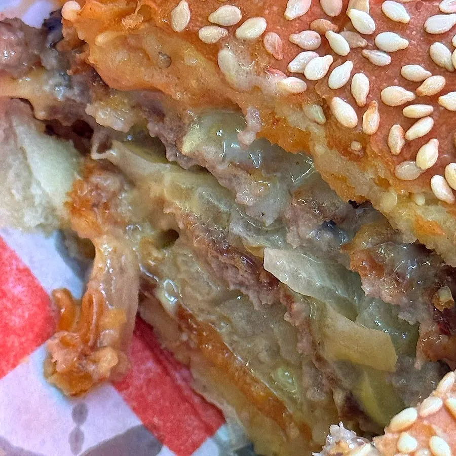 Bitten avocado burger