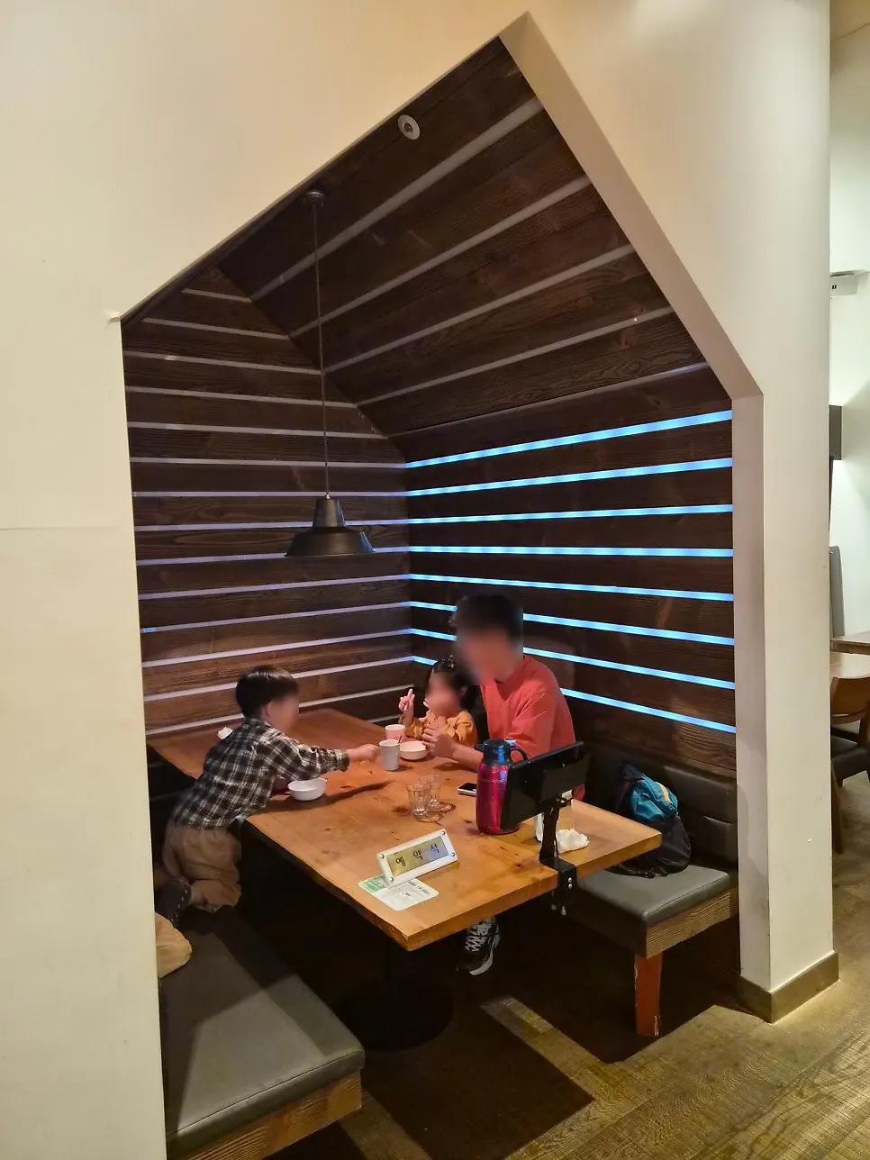 Spacious, semi-separated seating for a family meal