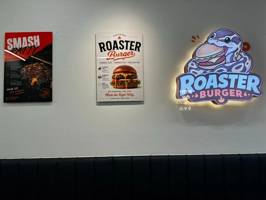 Snake character interior wrapped around a burger