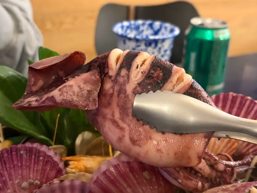 Hearty seafood jjim table spread