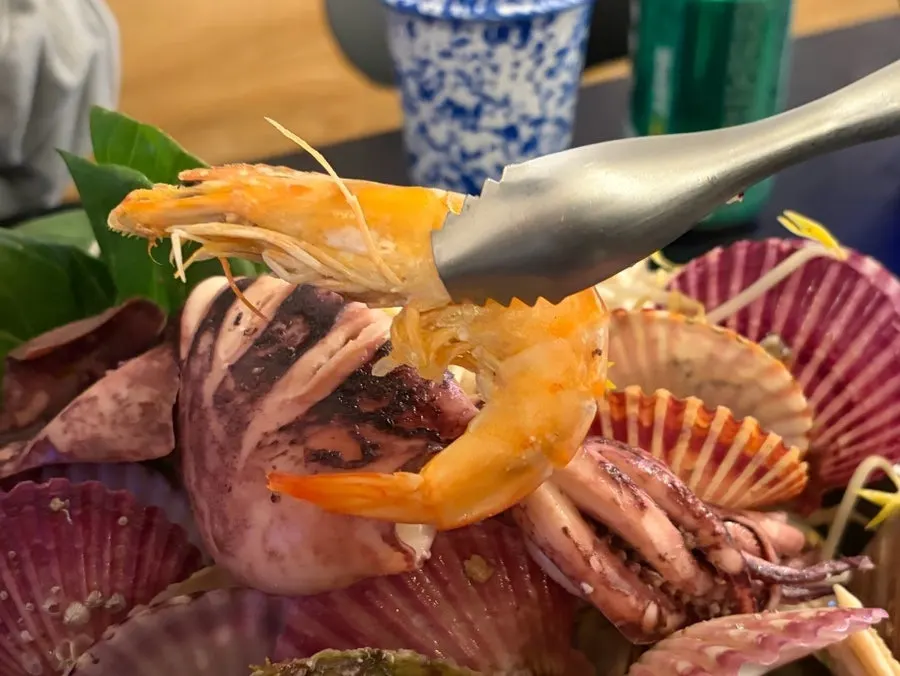 Seafood jjim with big chunks of squid