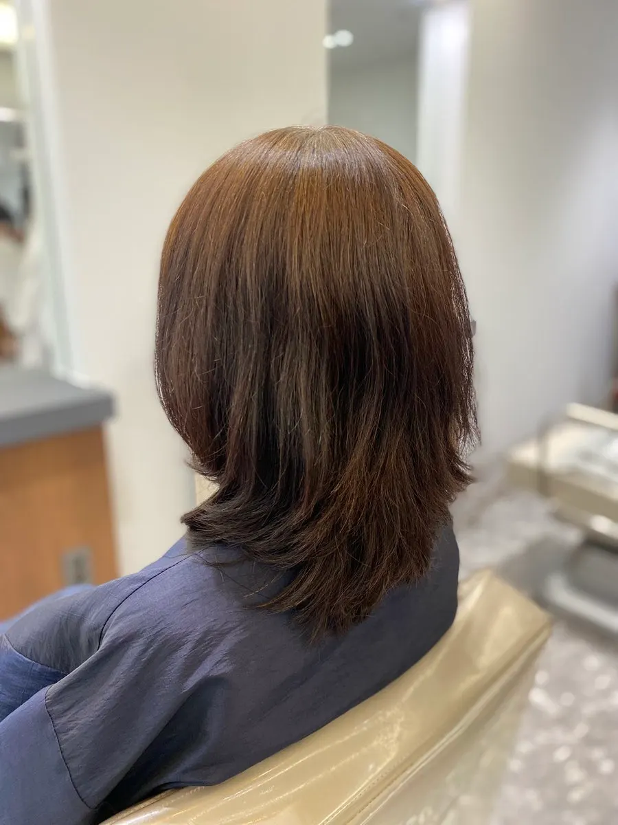 Before-and-after comparison of the volume magic C-curl perm