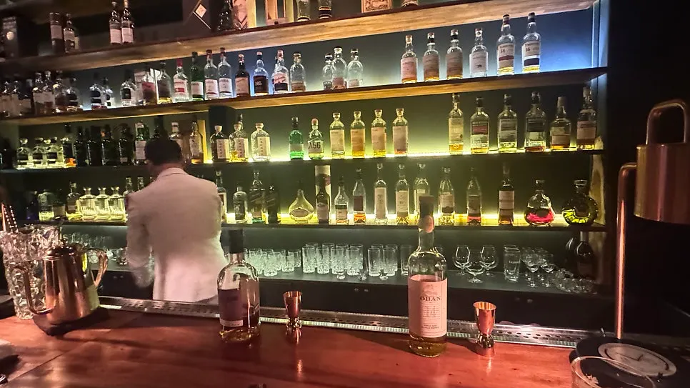 Whiskey bar interior with soft lighting