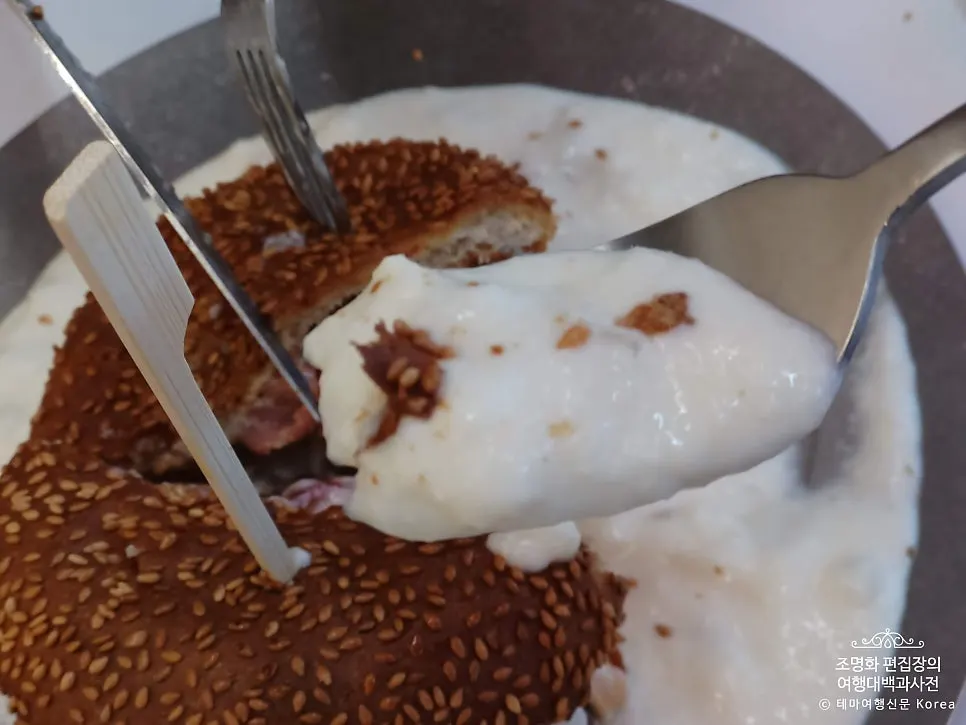 Cross-section of the white burger with sauce dripping out