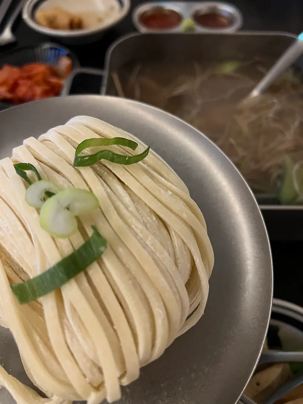 Kalguksu noodles simmered in the seafood broth