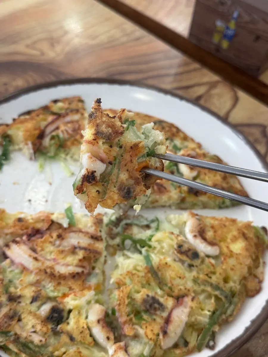 Cross-section of the seafood pancake showing squid