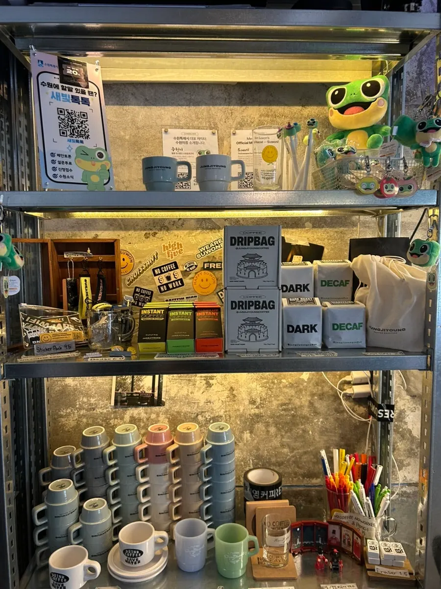 Interior of Jeongjiyoung Coffee Hwahongmun branch with customers on a weekday afternoon