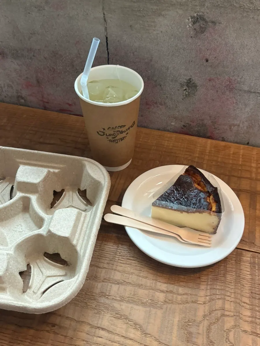 Drink and dessert on a table during a solo café visit