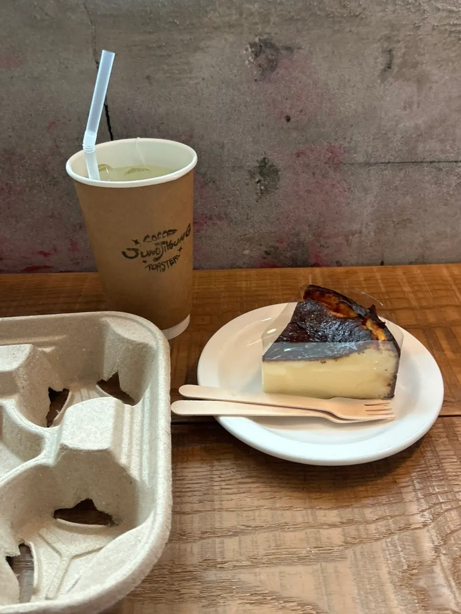 Close-up of a slice of dense Basque cheesecake