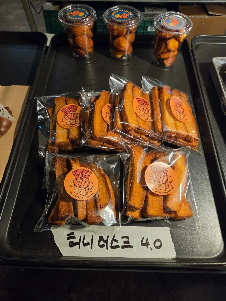 Packaged cookies and honey rusk on display