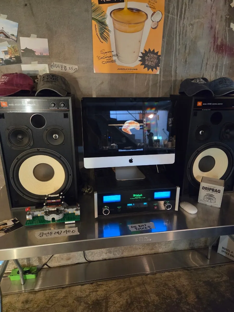 Handwritten menu board and vintage audio system