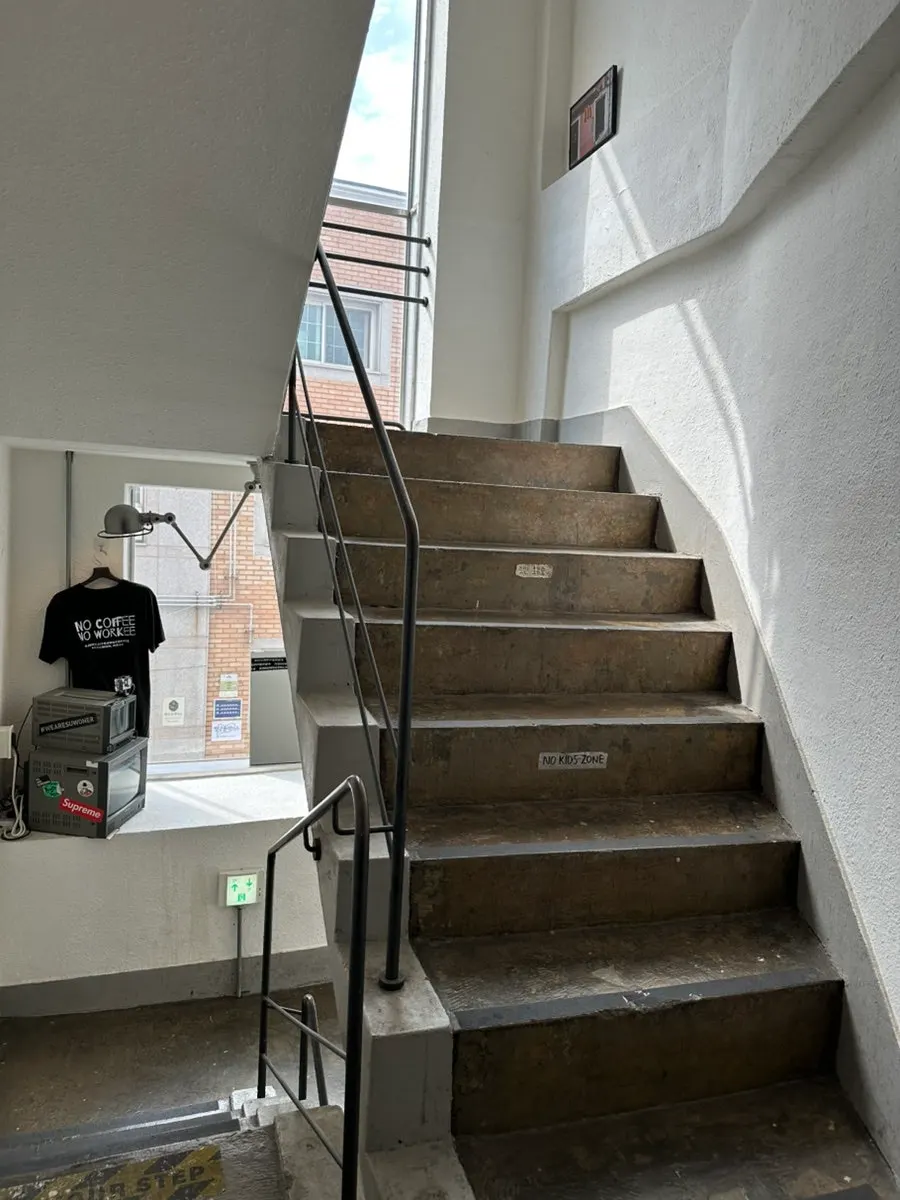 Café interior passage showing the ordering flow