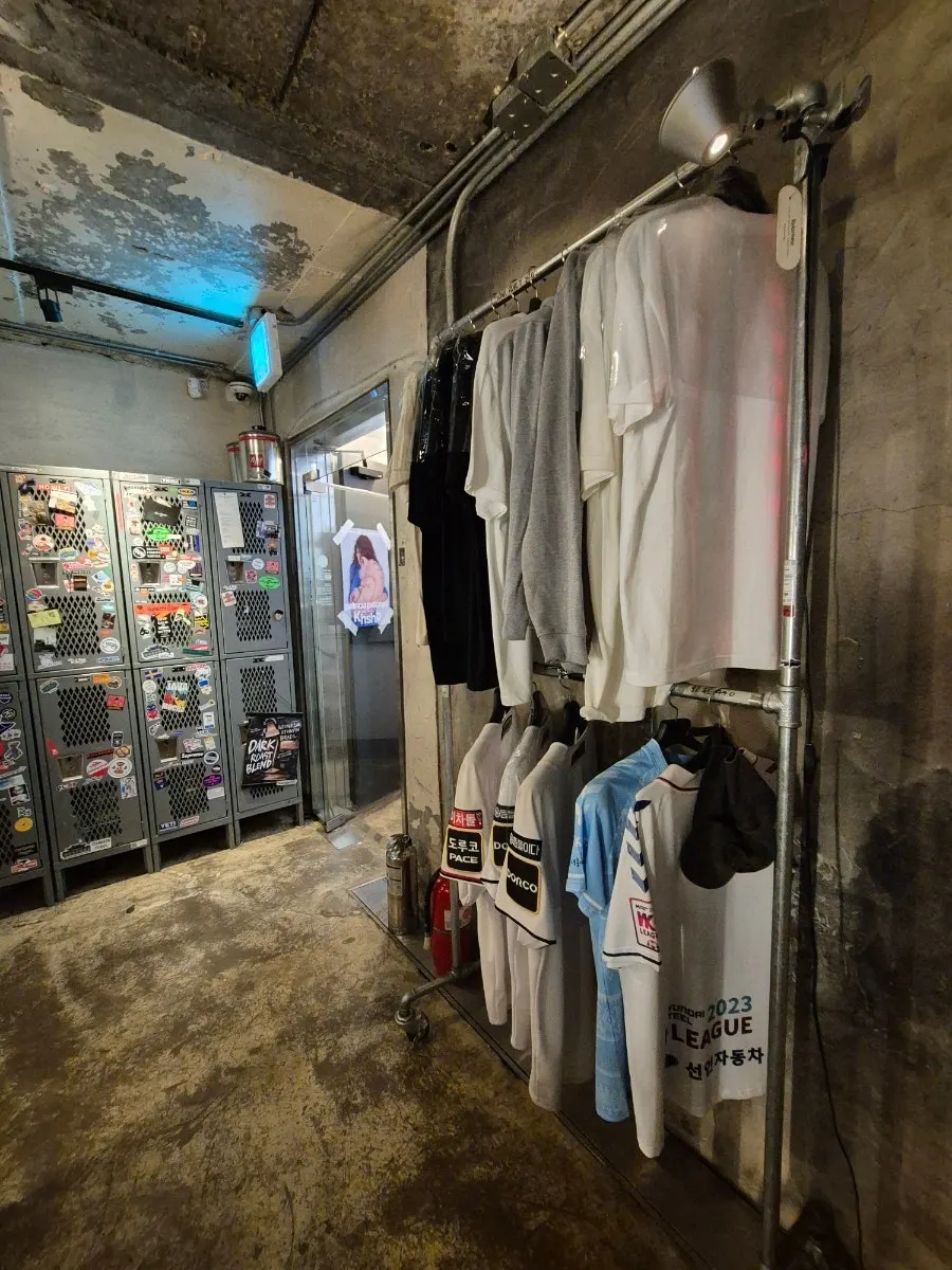 Café goods corner with T-shirts and hats