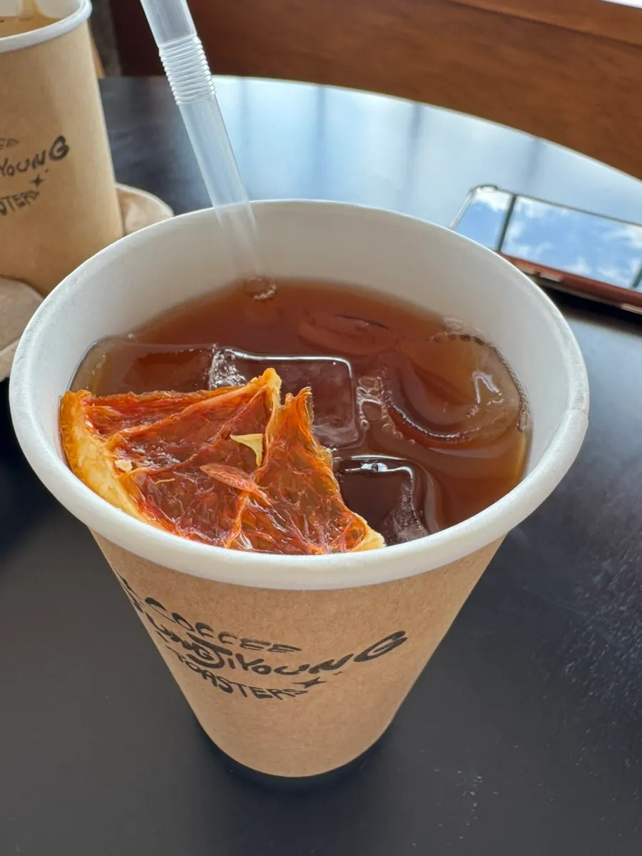 Honey black grapefruit tea with visible grapefruit pieces