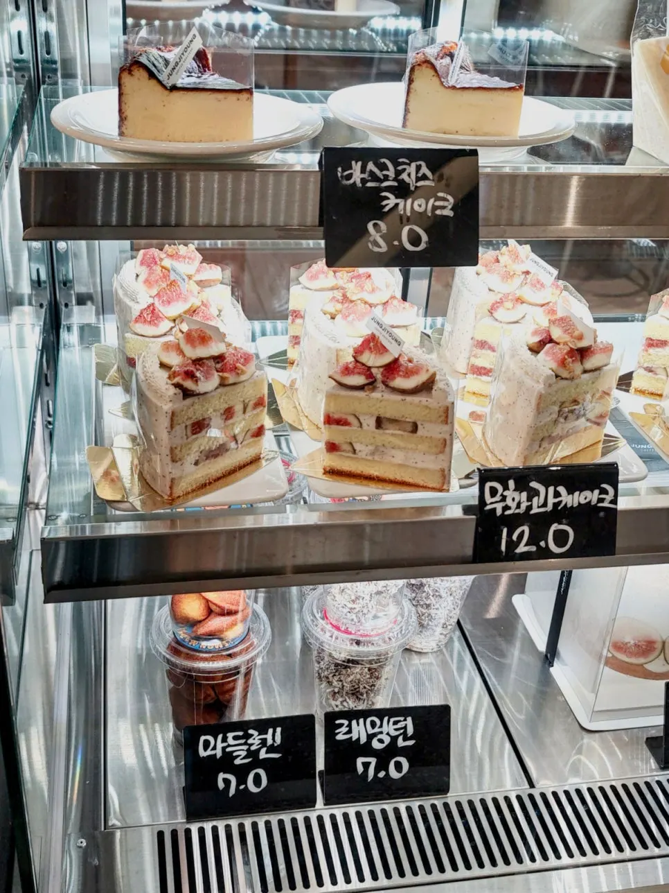 Basque cheesecake and fig cake in the showcase