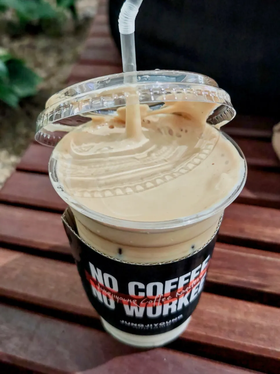 Coconut coffee and cookie enjoyed at an open table