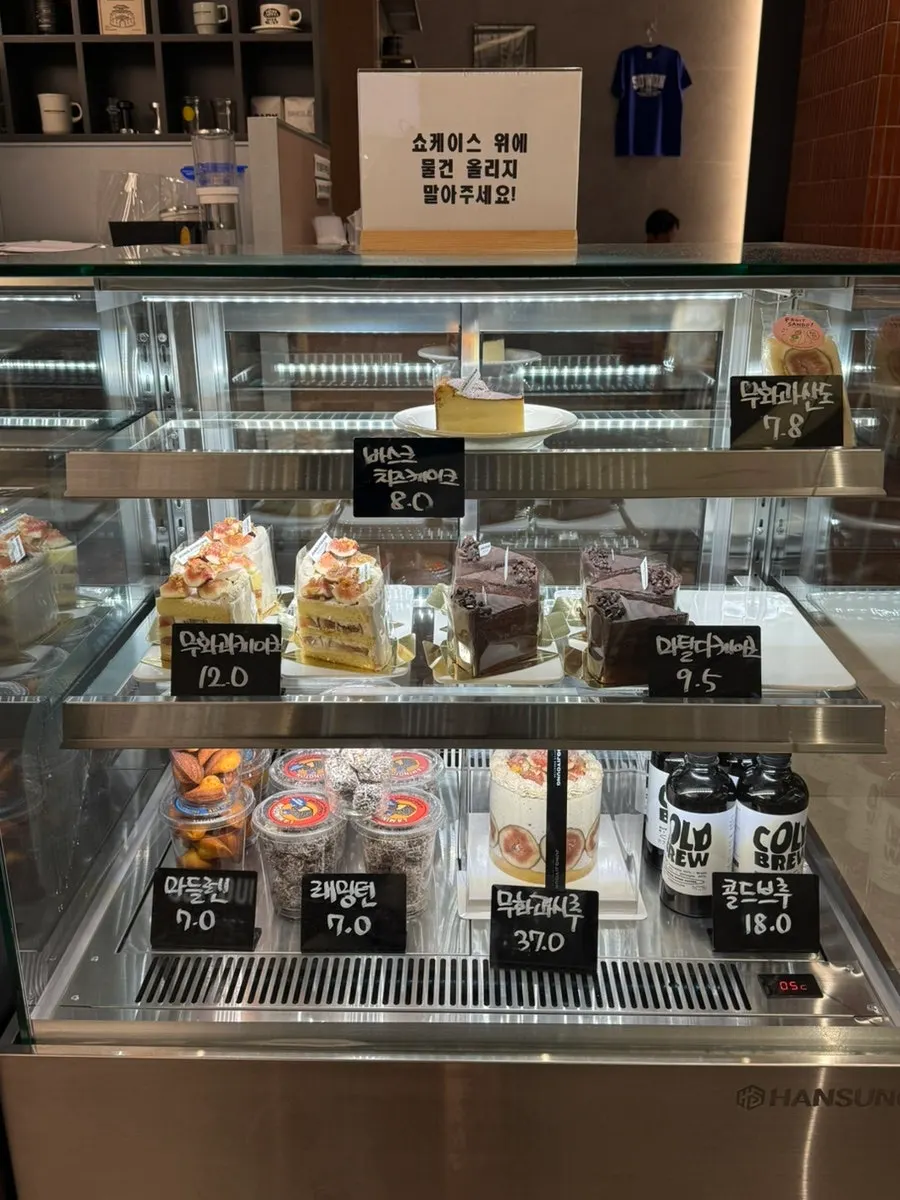 Cakes and cookies displayed in the dessert case