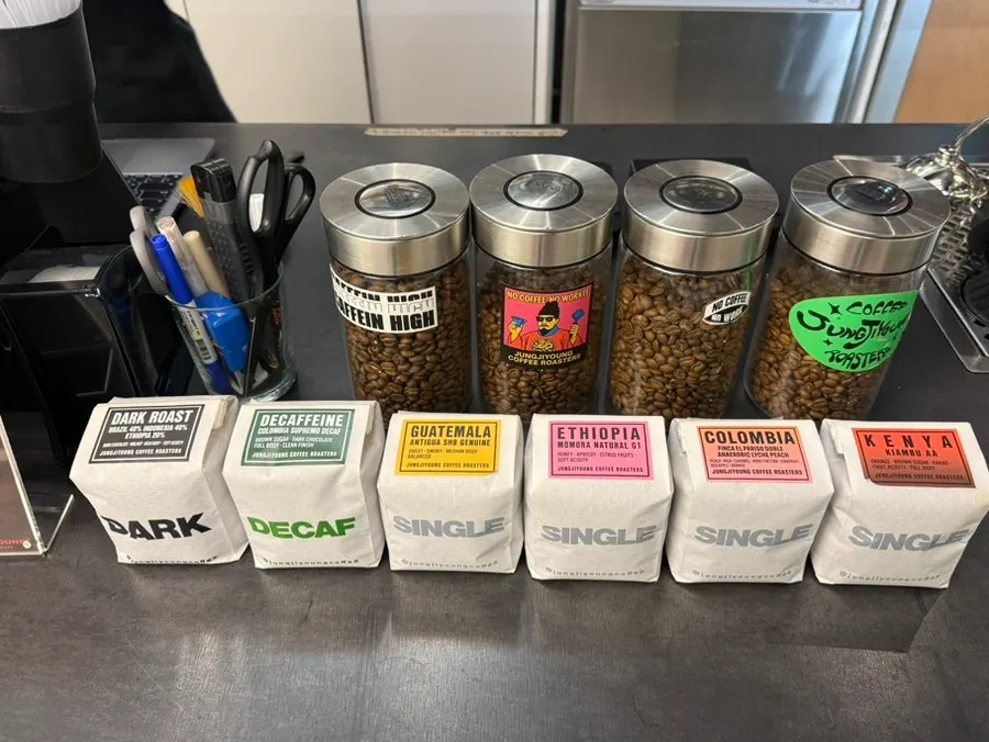 Coffee bean packages on display for sale
