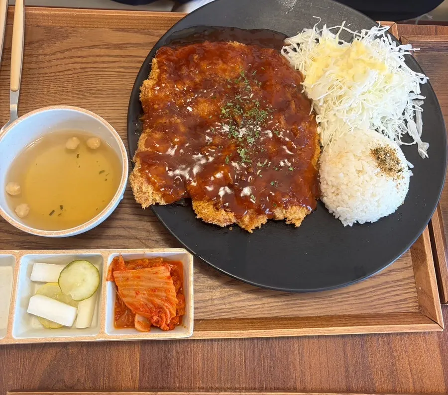 Jeongseong Katsu menu board listing cutlet, noodle, and rice dishes