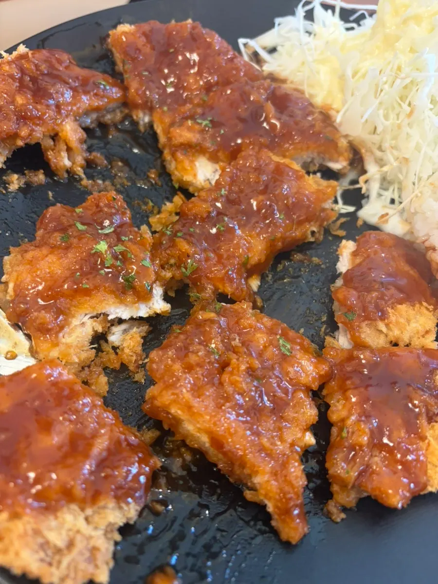 Plate of gyeongyangsik king donkatsu topped generously with sauce