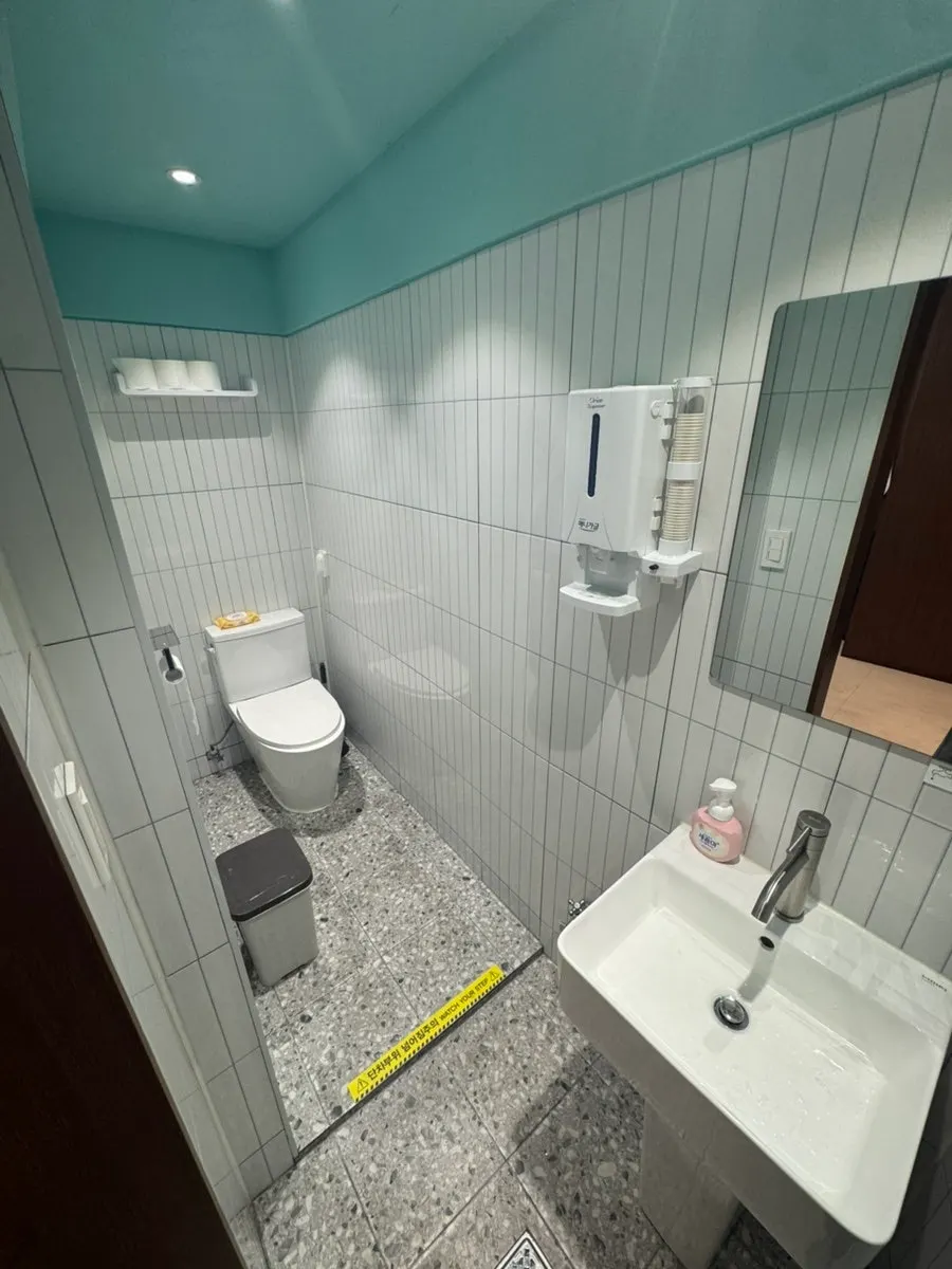 Sink area in front of the restroom
