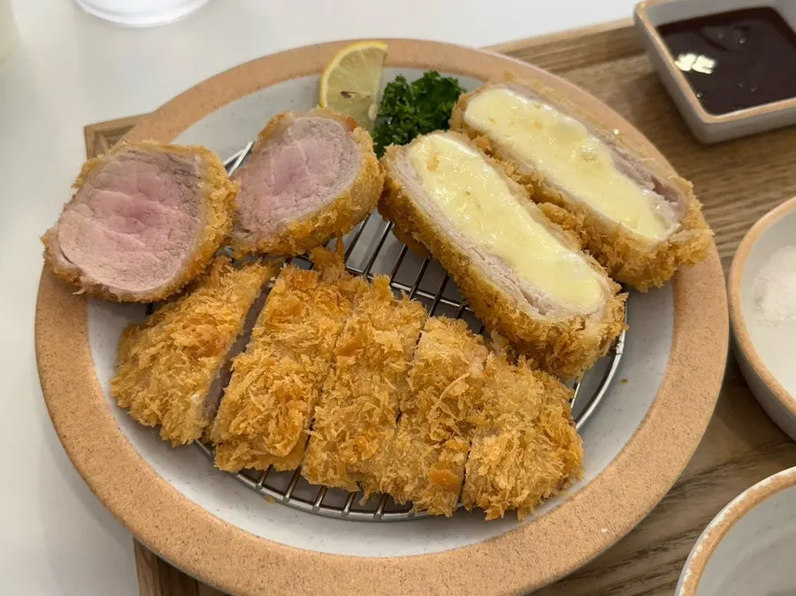 Plate of mixed katsu with tenderloin, pork loin, and cheese