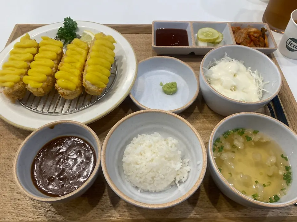 Cross-section of gosuma cheese katsu showing melted cheese
