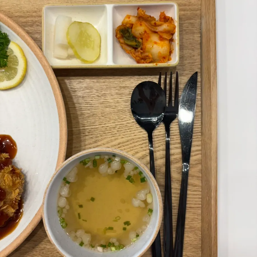 Set meal served with broth, pickles, and kimchi