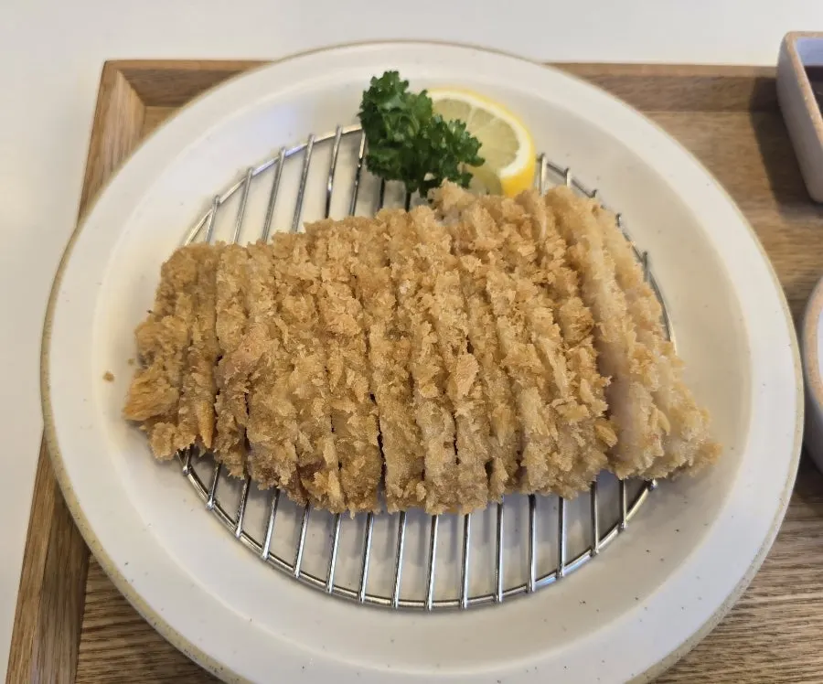 Cross-section of crispy-breaded pork jowl katsu