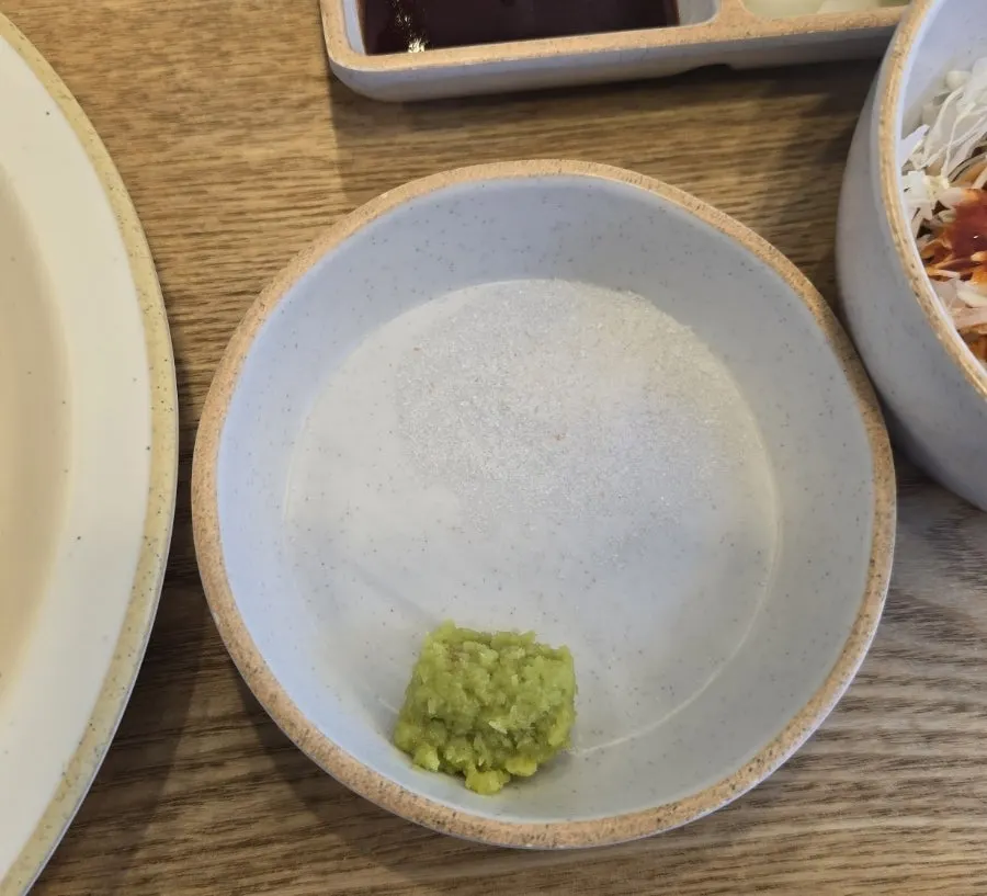 Pork jowl katsu served with wasabi salt