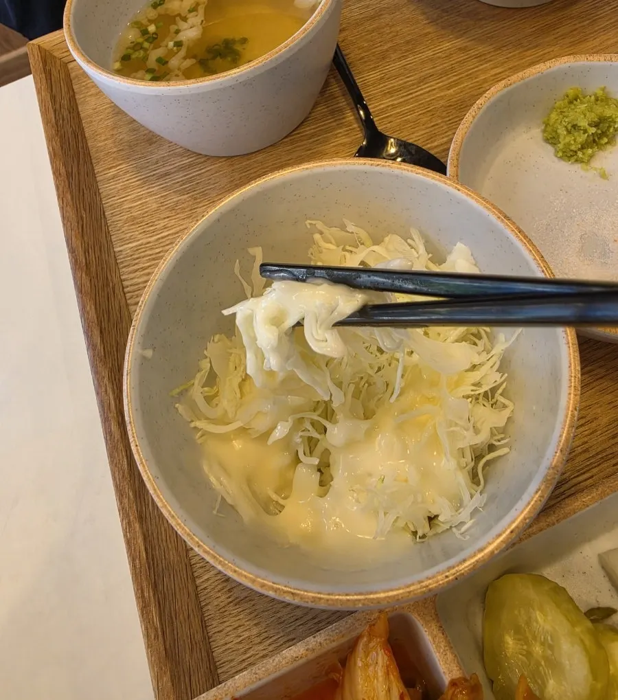 Cabbage salad served with sauce