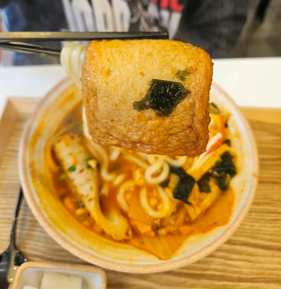 A bite of tonkatsu with sauce