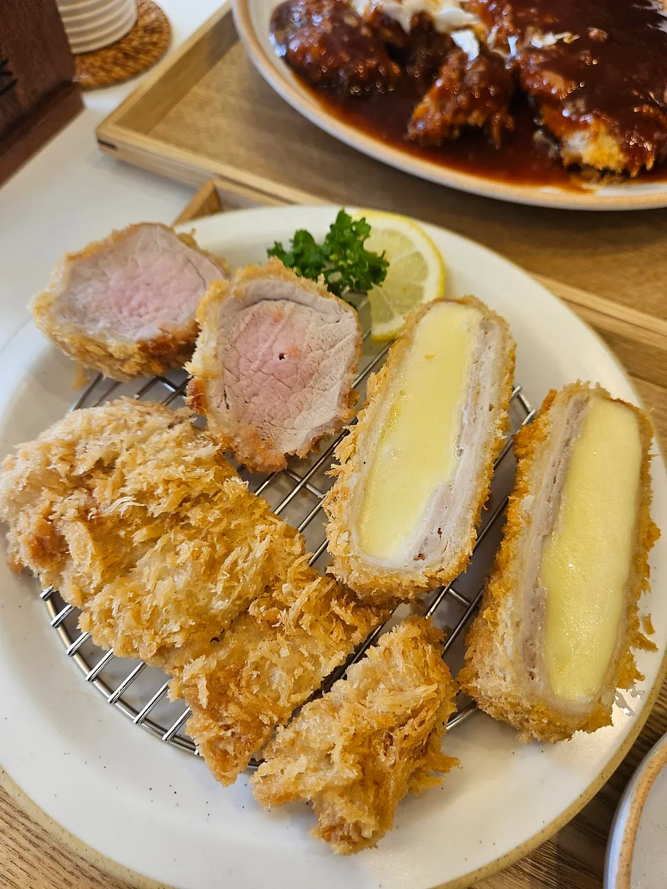 Broth and fish cakes in the Kimchi Fish Cake Udon