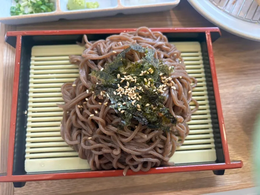 A piece of hire katsu dipped in sauce