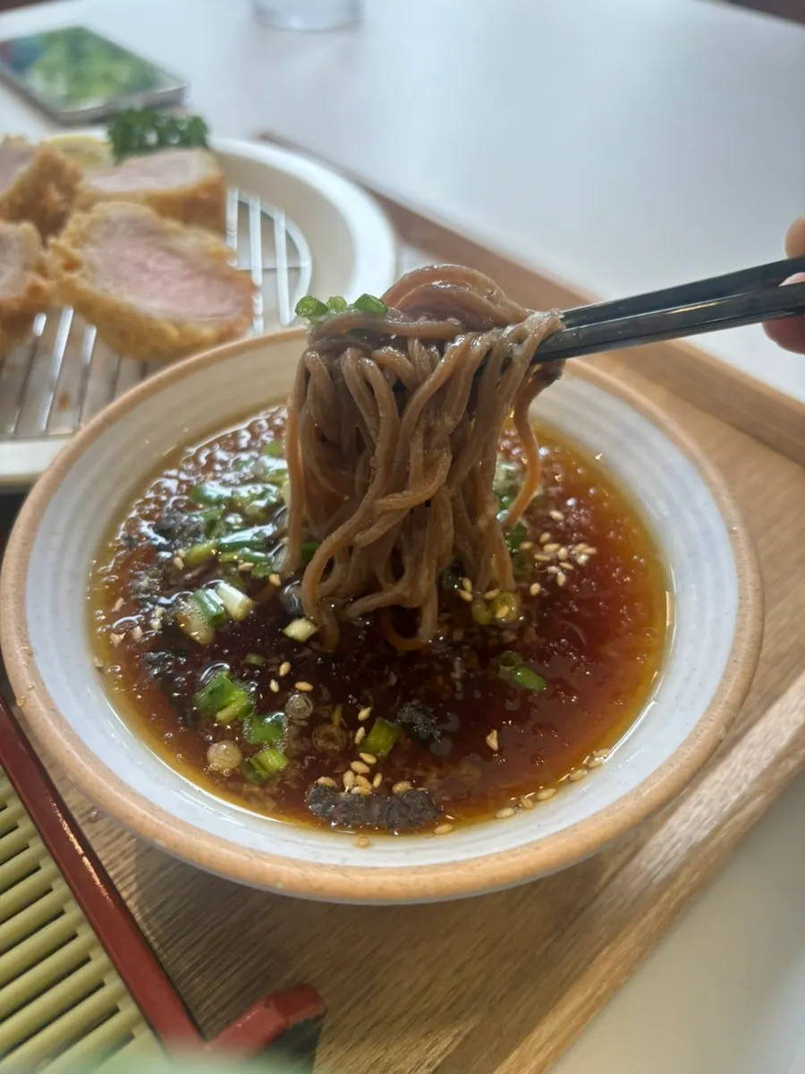 Generous serving of soba noodles with dipping sauce