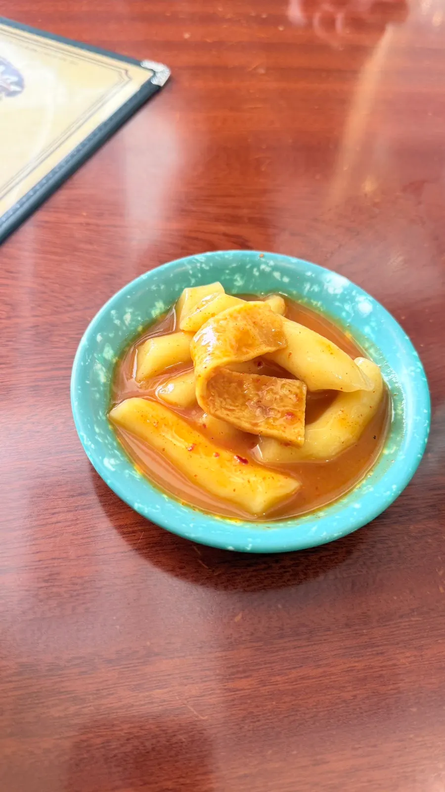 Free pre-meal tteokbokki served before the meal