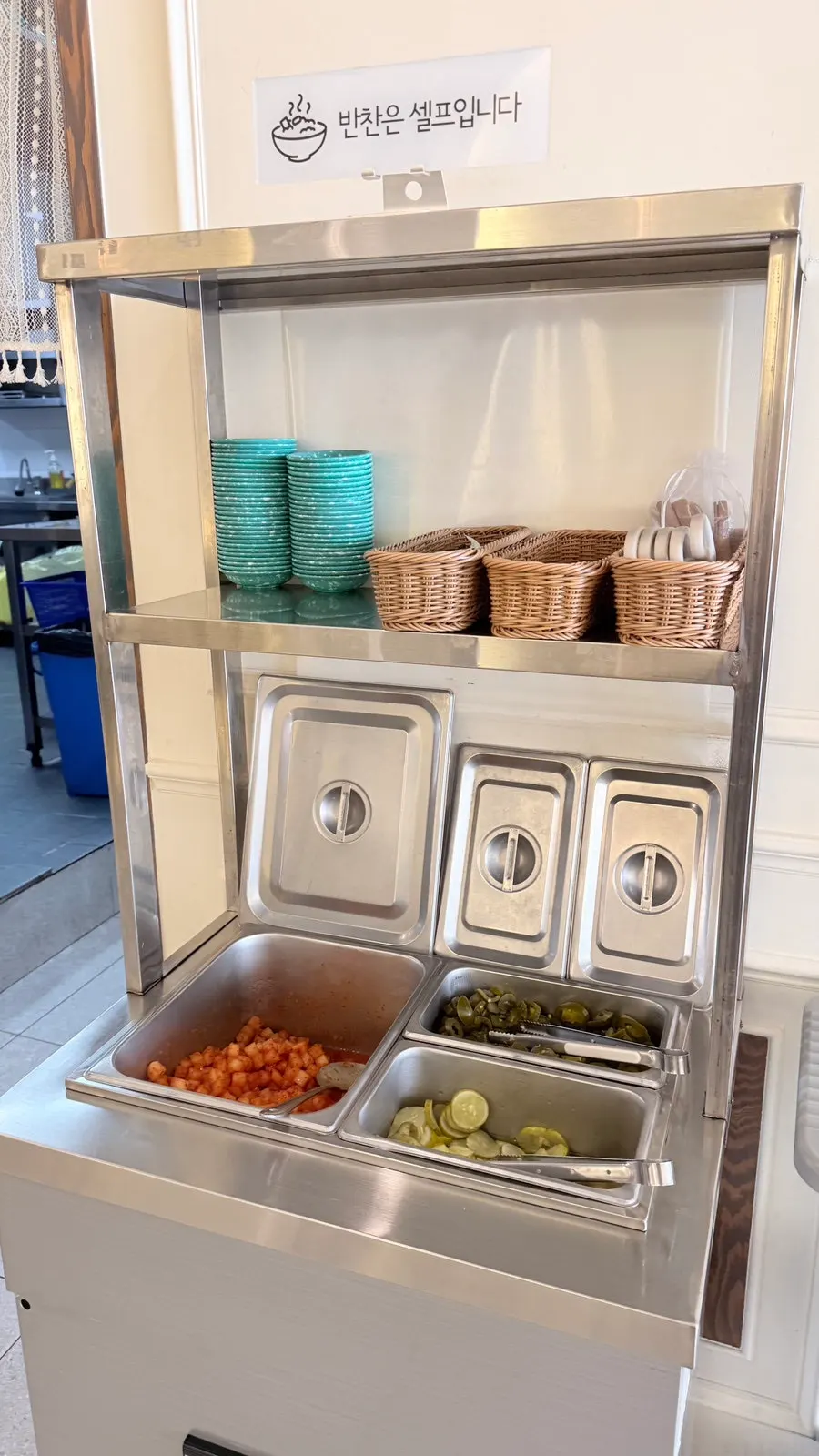 Pickles and jalapeños at the self-serve bar