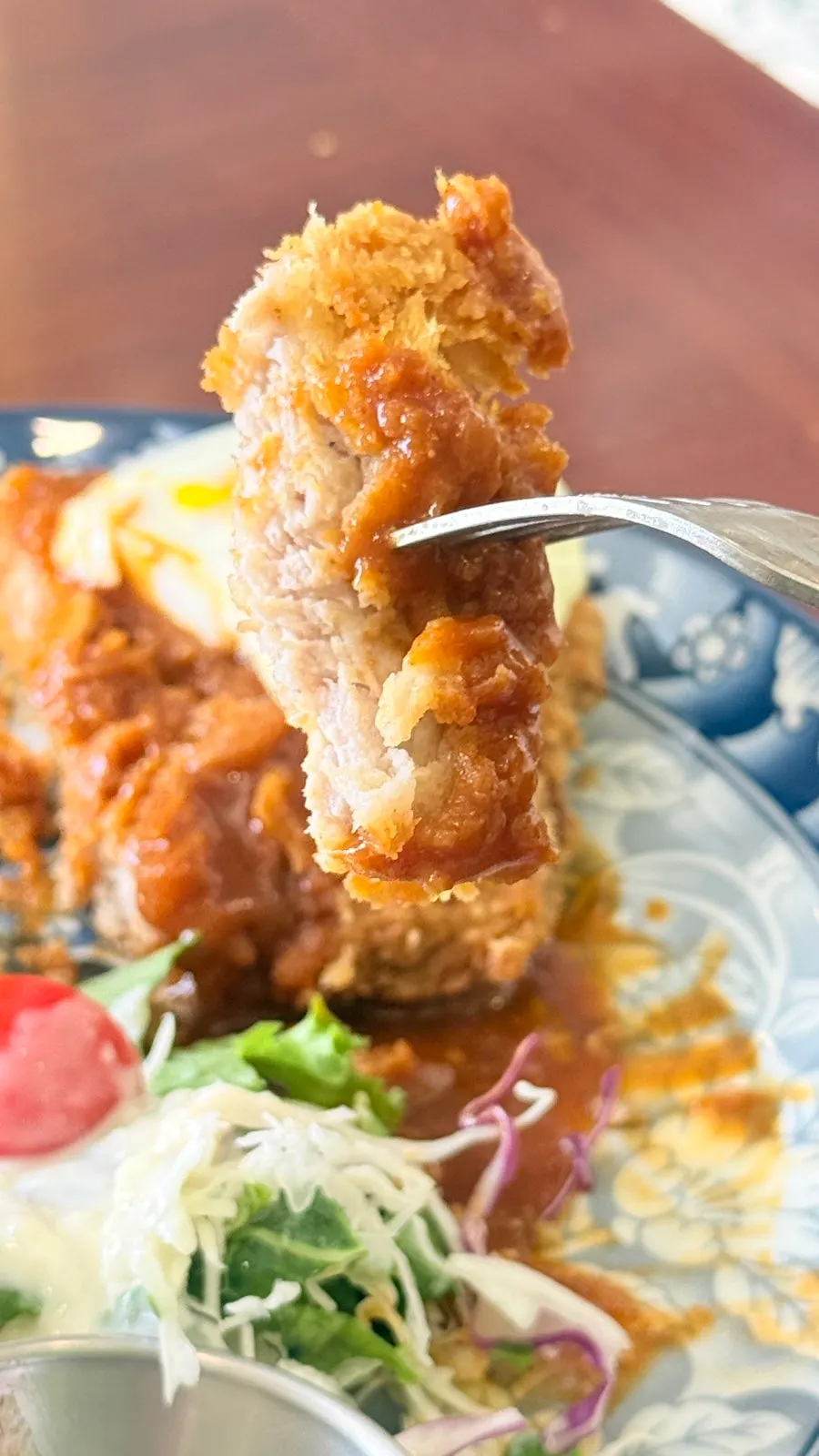 Cross-section of the pork cutlet showing the thick loin