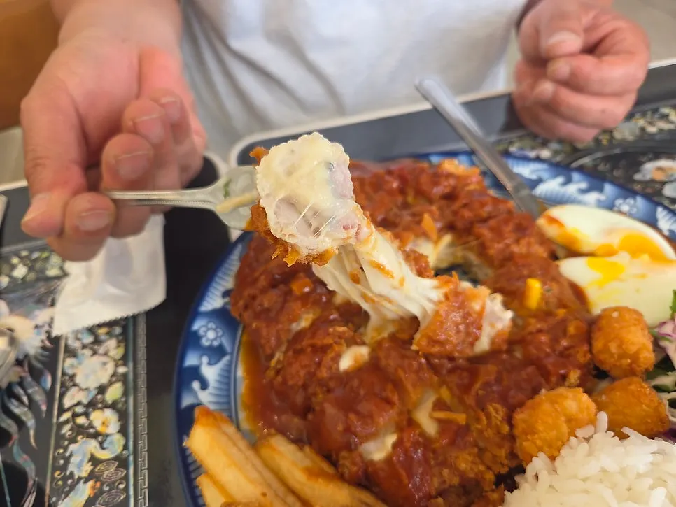 Cross-section of the thick cheese pork cutlet