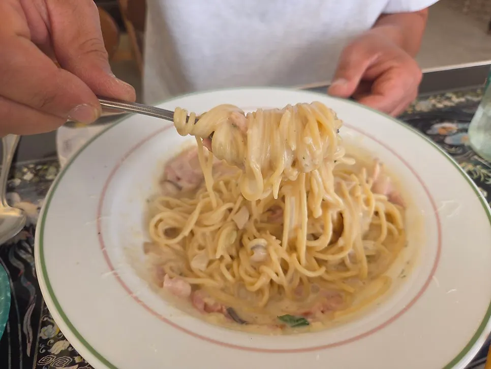 Thick, creamy sauce on the bacon cream pasta
