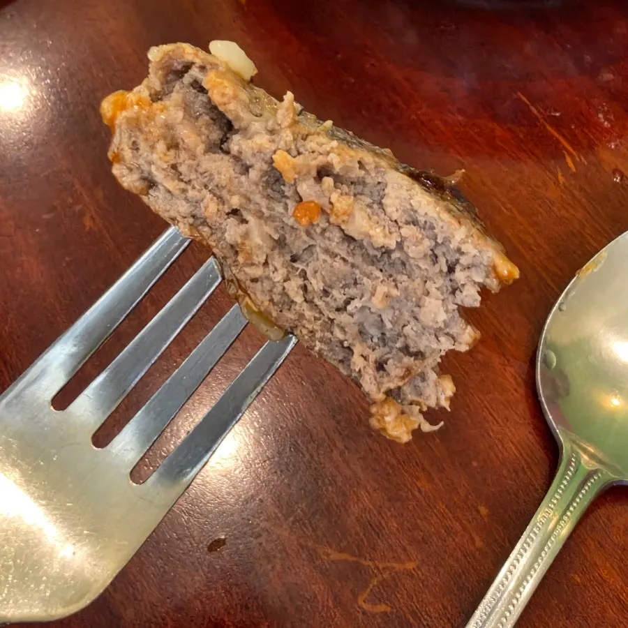 Rice mixed with sauce and a piece of hamburg steak