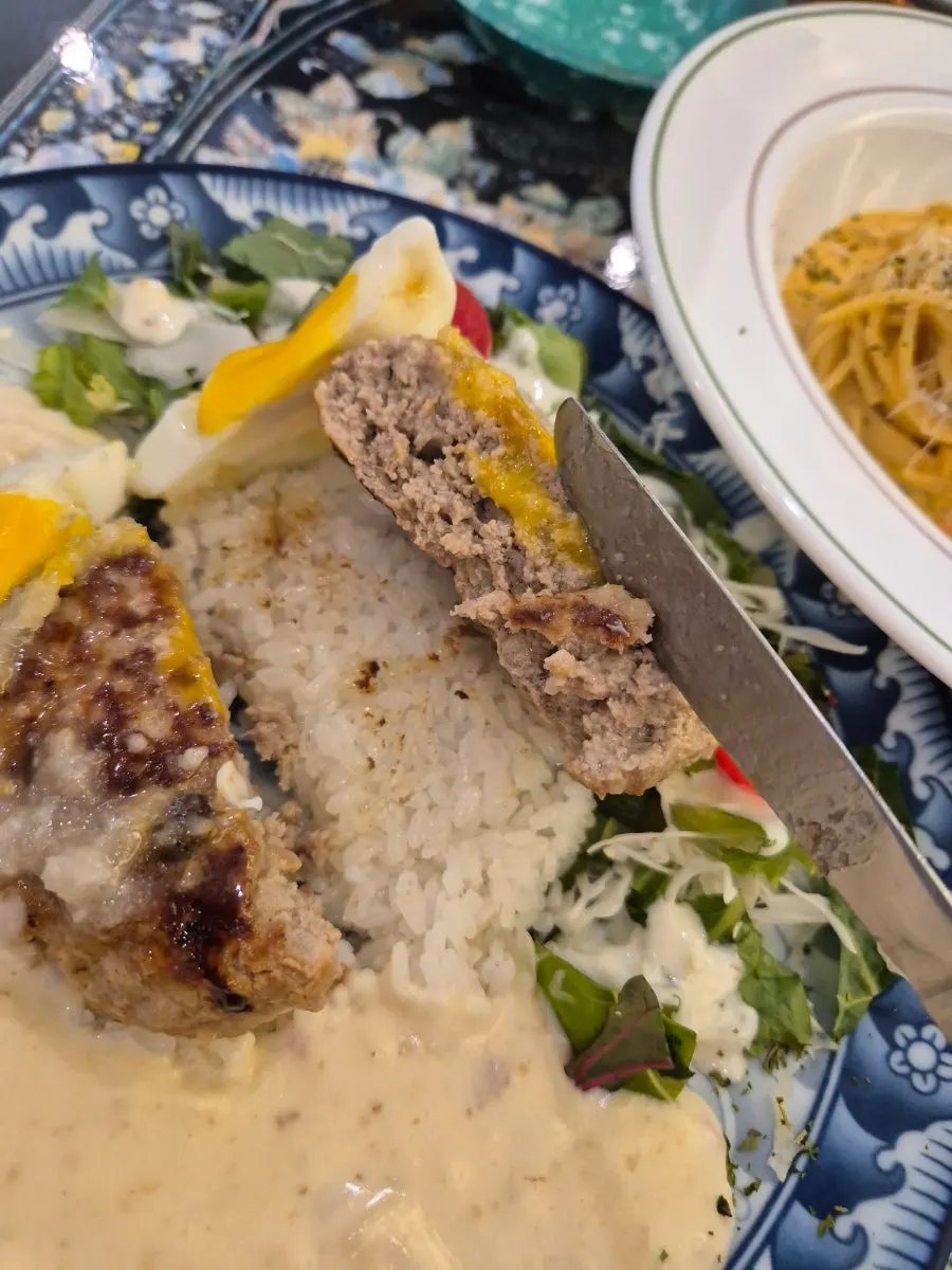 Garlic cream hamburg steak with cream sauce underneath