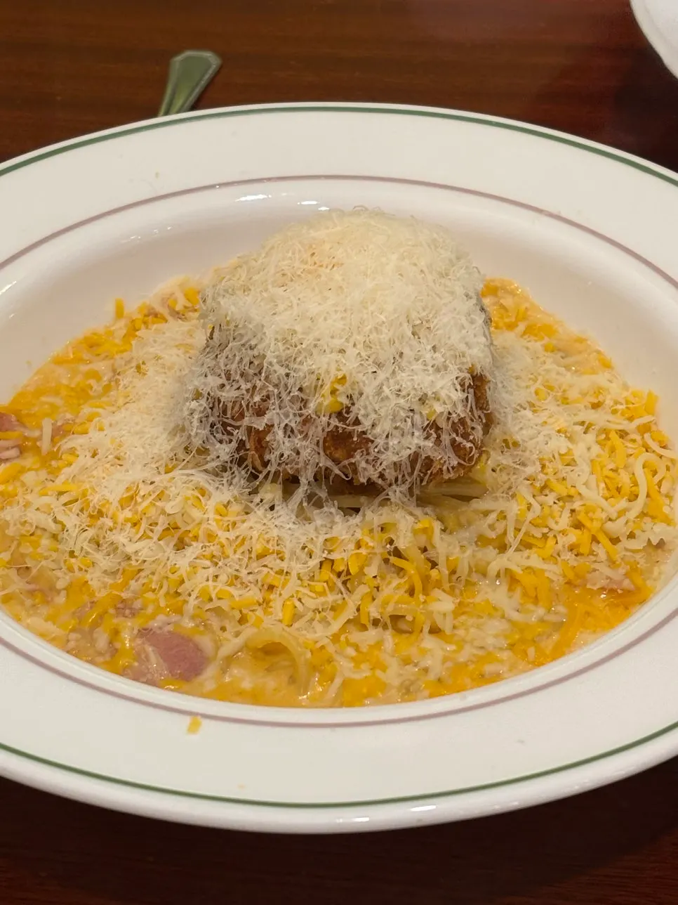 A hearty spread with pasta and pork cutlet together