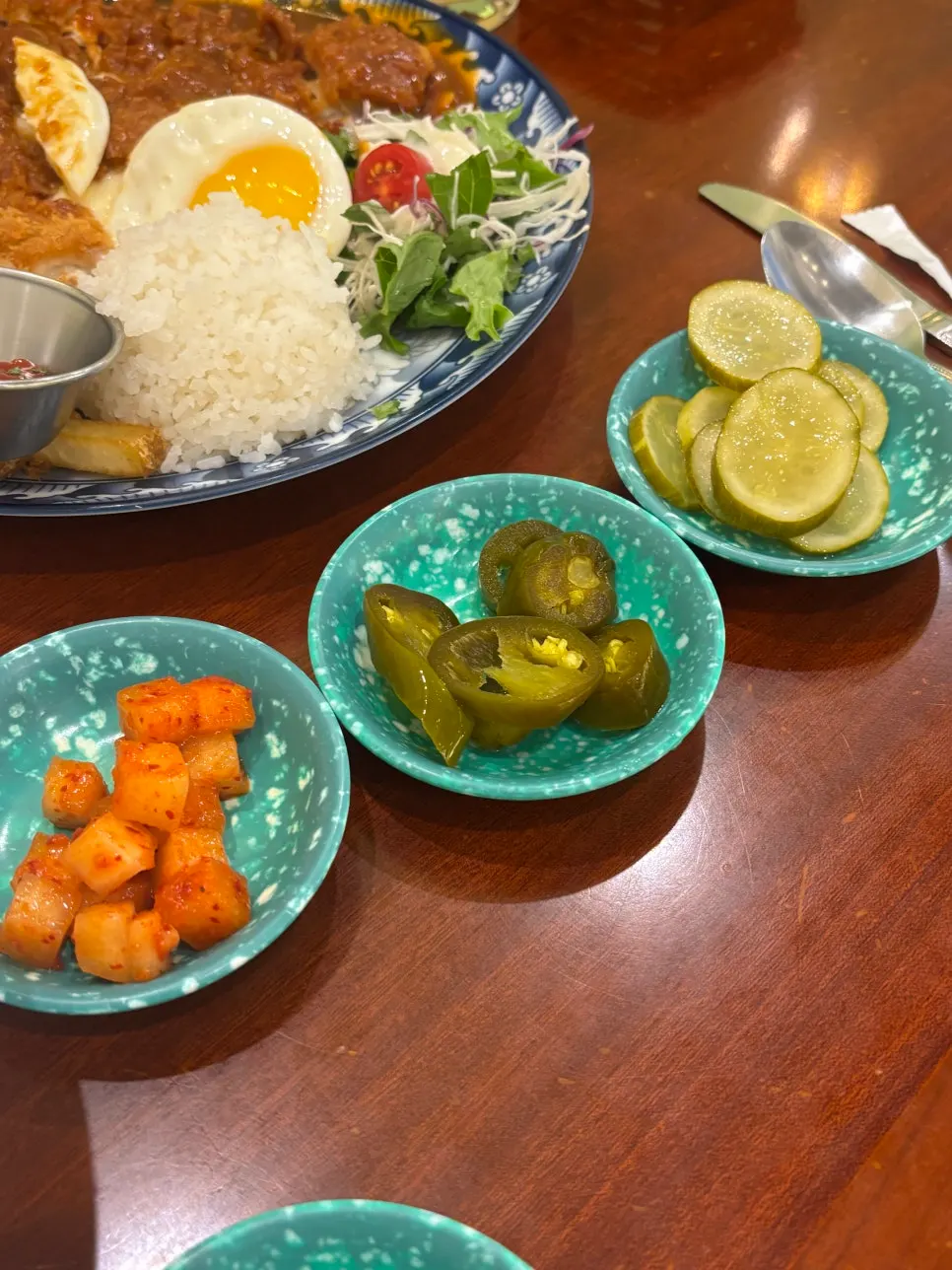 Kkakdugi and pickles brought over from the self-serve bar