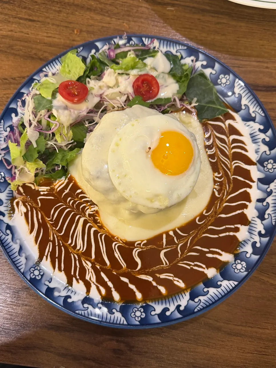 Mozzarella cheese hamburg steak covered in cheese