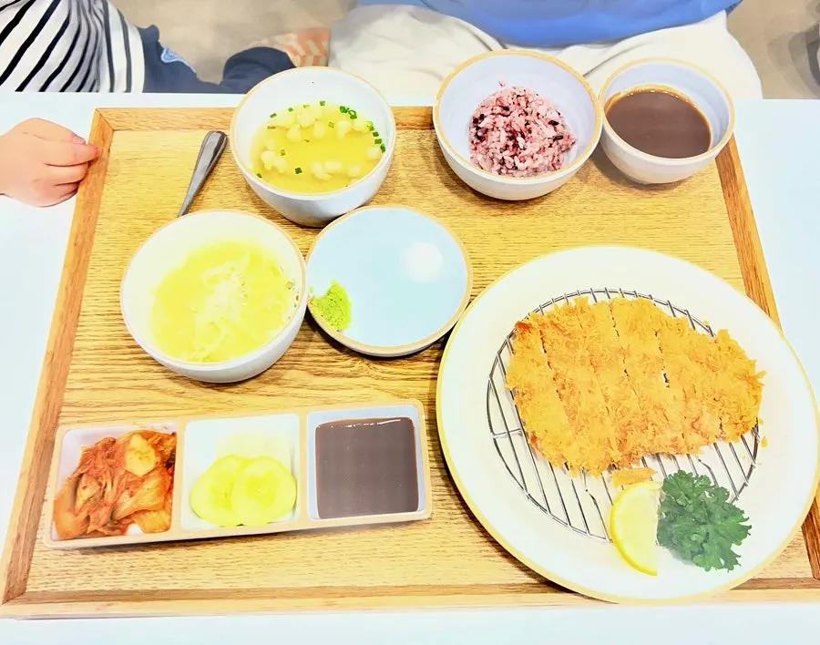 Basic side dishes: kimchi, cucumber pickles, radish, and sauce
